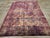 This mid-20th-century Central Asian Silk Turkoman tribal accent rug presents a richly patterned allover composition in...
