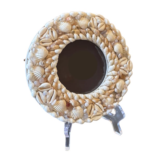 Hand embellished round photo frame finished in resin. Available with acrylic stand. This is the very first piece of the...