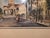 Capturing the timeless charm of historic South Carolina, this 1981 limited-edition offset lithograph titled "April in...