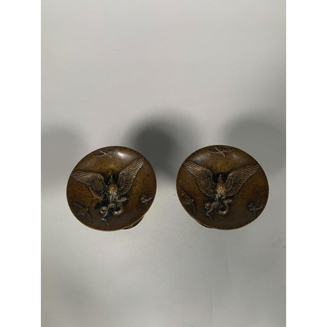 Christophe Fratin (1801-1864) Pair of bronze cups known as "bear cups," with a brown patina. The stems depict acrobatic...