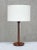 This rare, tall table lamp was produced by falkenbergs belysning in sweden during the 1950s. It is marked “flb” along with...