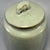 This elegant Chinese celadon covered jar is fitted with a lid and covered with fine crackle glaze. Crafted in the time-...