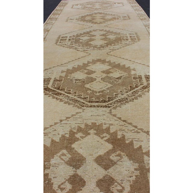Tan Light Colored Hand Knotted Vintage Oushak Gallery Runner With Geometric Medallions For Sale - Image 8 of 13
