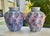 Vintage Chinese hand-painted vases, a pair. Elegant and mirror-matched, this pair of vintage ceramic vases features soft...