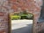Large Antique 19th Century English Gilt Overmantle Mirror with Shaped Top For Sale - Image 6 of 7