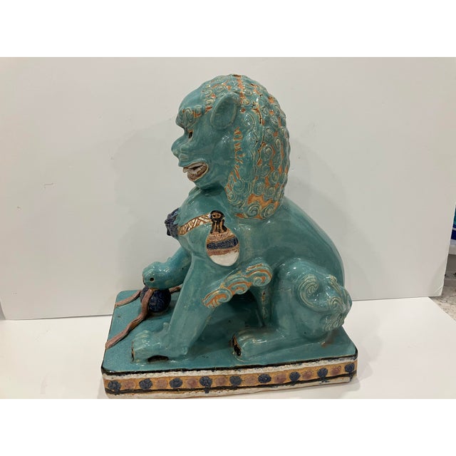 This 20 inch high ceramic lion was made in China in the late 90’s In very good condition Very rich colors A real guardian...