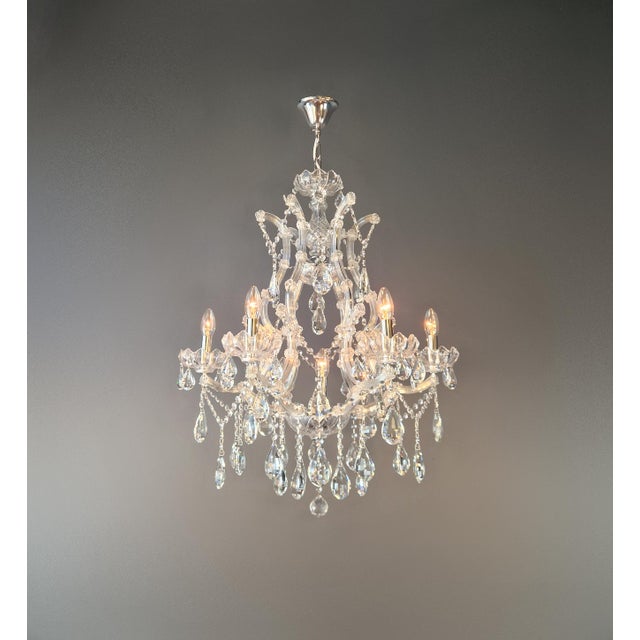 New Maria Theresa-style crystal chandelier A beautiful, handcrafted chandelier in the classic Maria Theresa style....