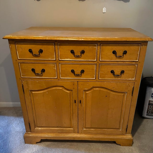 Beautiful Guy Chaddock pine distressed chest. Six drawers and two doors that open to two shelves for storage. Cabinet...