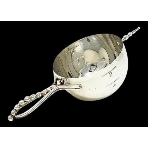 Art Deco spirit measure / jigger. Bottom up / roll over type of hemispheric form made to rest on top of your glass or...