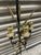 Black painted metal sword wall sconces for candles. Gold painted metal accompany the design and the candle cups are gold...