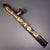 This is an antique opium pipe, a traditional smoking implement featuring a long, carved bone or ivory-colored shaft. The...