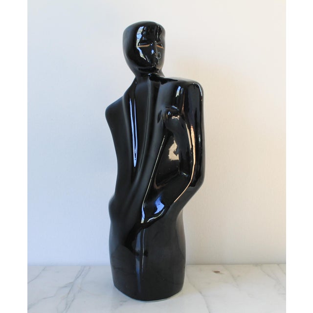 Vintage postmodern style black ceramic male figure. Minor age wear. Some small paint touch ups. No makers mark.