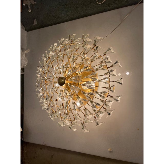 Large crystal brass flushmount 1970’s stilkronen height 26 cm width 60 cm features 12 lights requires e14 light bulbs most...