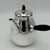 A Georg Jensen designed sterling silver tea and coffee service from Copenhagen, Denmark 1915. All six pieces are...