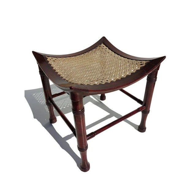 CIRCA 1890 Curved seat frame on four turned legs united by stretchers, with interlaced seat Excellent condition. This...