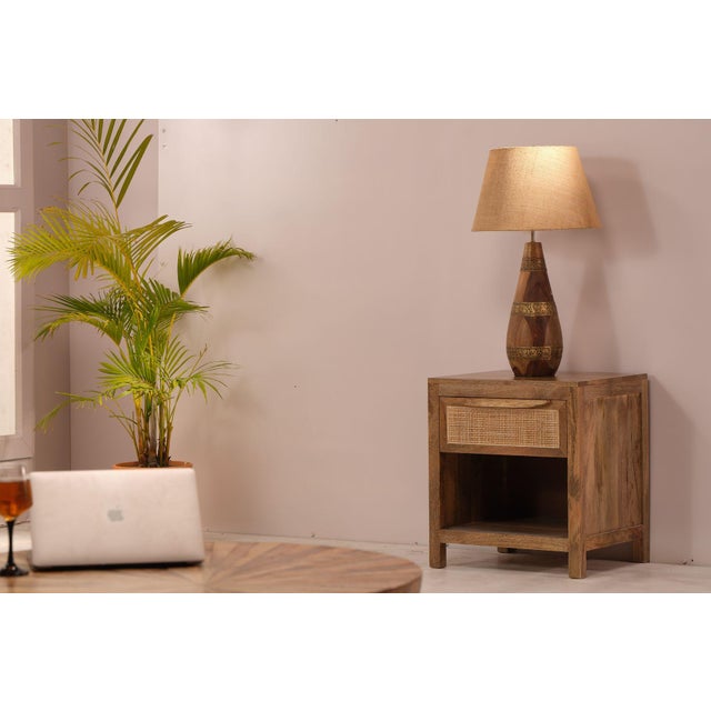 Crafted from Wood, it features a Natural wood finish finish that adds warmth and character to any room. Measuring 20 x 16...
