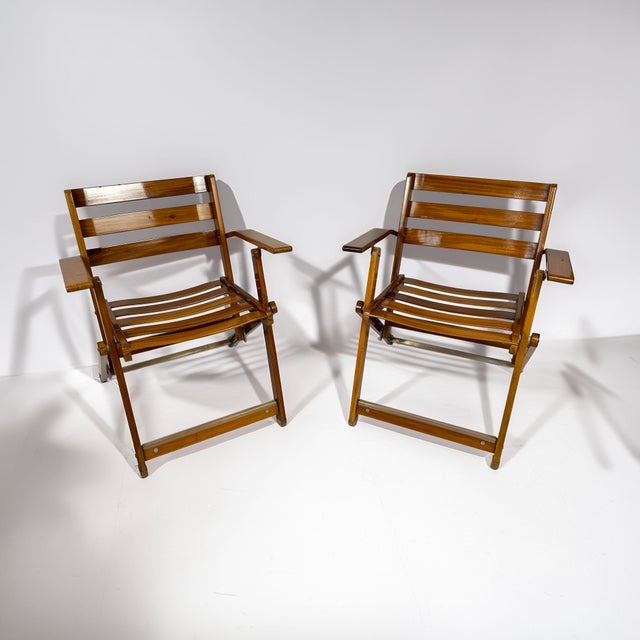 Deck chairs, yes — but the kind that suggest a terrace alongside the lake rather than a caravan site. So think 'yacht',...
