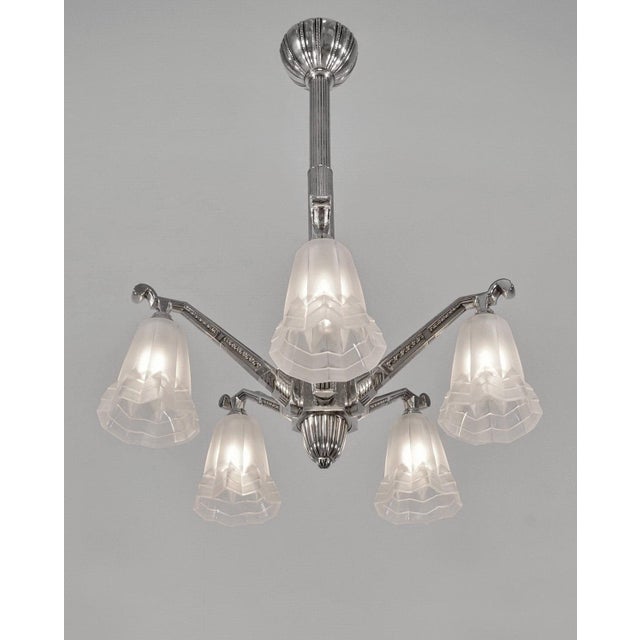 Degué A French 1925-1935 art deco chandelier in nickel plated solid brass or bronze. A beautifully shaped downlight...