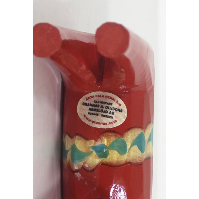 This is a beautiful piece of Swedish folk art from the seventies. It is a Dala horse, hand carved and painted in a deep...