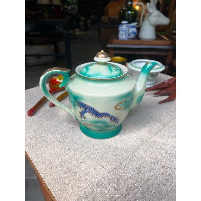 Up for consideration is a beautiful vintage Asian style ceramic teapot. This would look lovely in your home and it is a...