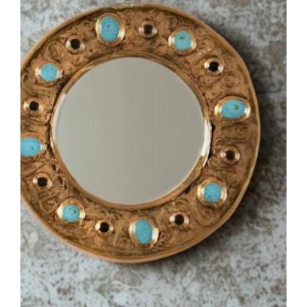 Round glazed ceramic wall mirror by the French ceramicist Francois Lembo, Vallauris, circa 1970s. The circular frame is...