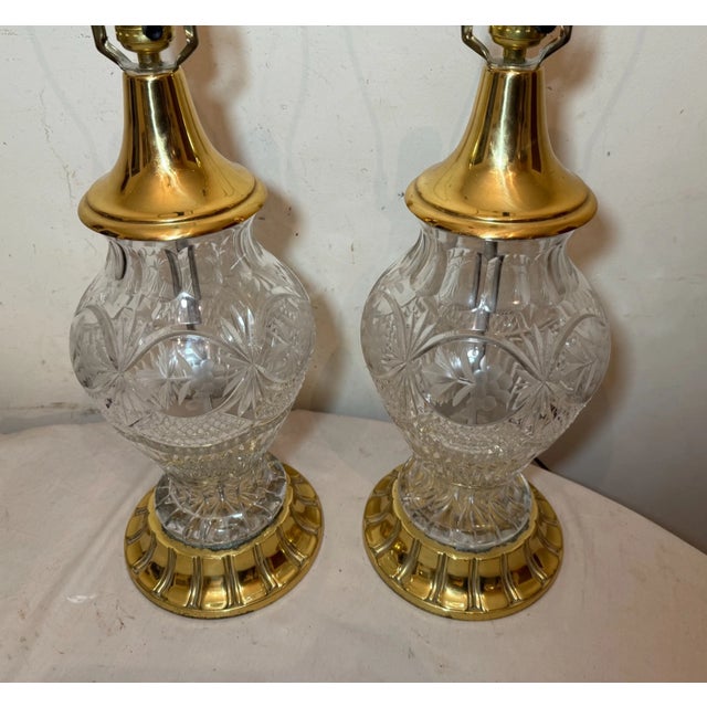 Up for sale is a very nice quality pair of large vintage brass and cut crystal electric table lamps. They're made into...
