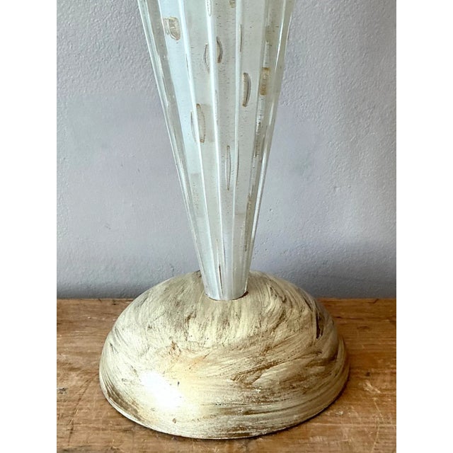 Illuminate your space with the exquisite artistry of this vintage Italian Murano glass table lamp, a stunning example of...
