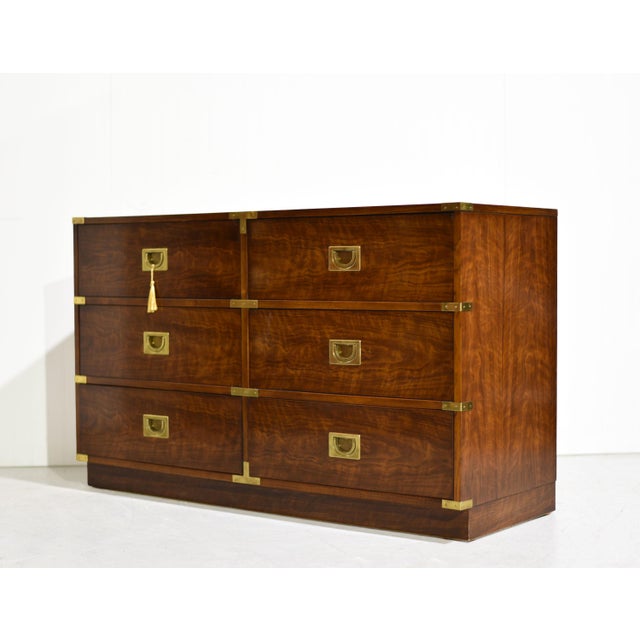 A timeless blend of clean lines and campaign-inspired design, this lowboy dresser from Drexel Heritage's Brigade...