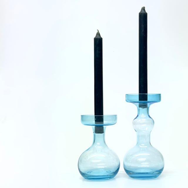 Pale blue transparent vases, set of 2. A groovy pair of curvy pale-blue glass candlestick holders or vases, perfect for...