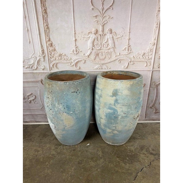 A breathtaking and highly coveted pair of monumental barrel-form planters in the manner of Atelier Vierkant, exhibiting...