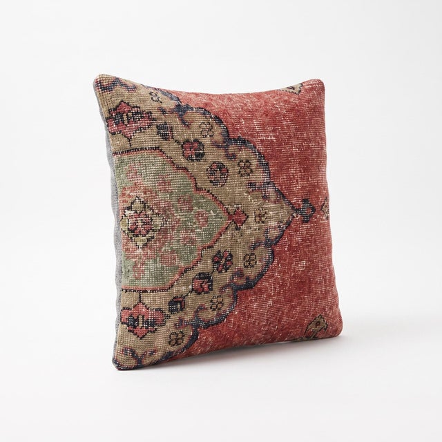 This beautiful 20'' x 20'' pillow cover was made from an authentic Turkish rug. Bright colors of wool adorn the front of...
