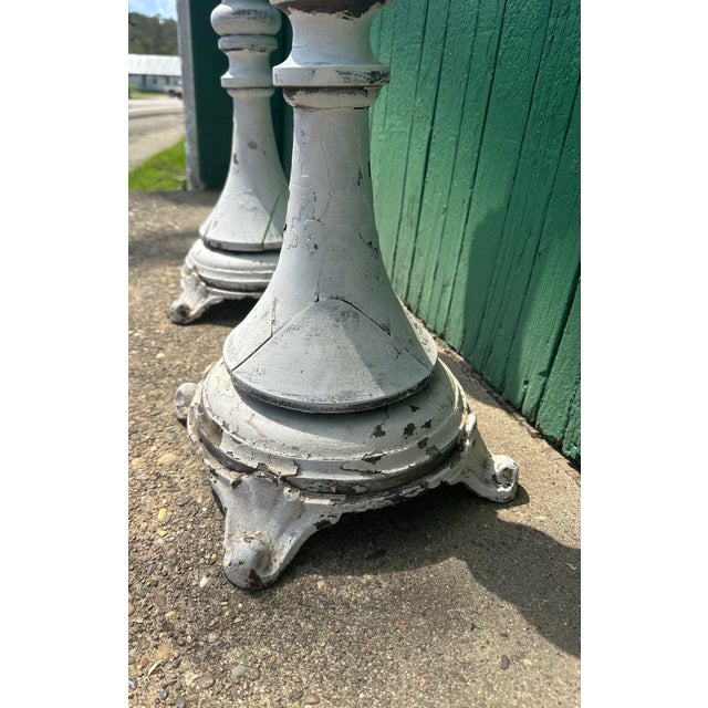 A monumental pair of antique Neo-Classical church altar processional or Paschal candlesticks, dating from the late 19th to...
