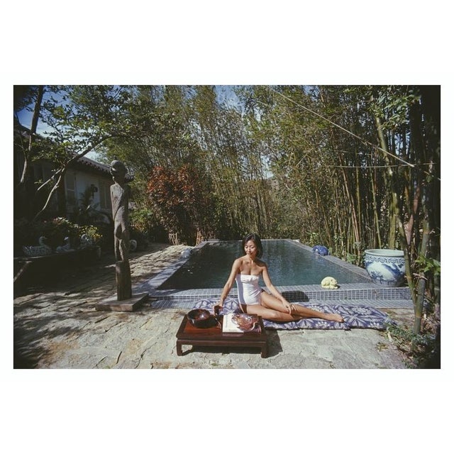 Cecily Godfrey 1979 Cecily Godfrey relaxes by the pool at her home in Hong Kong, 1979. Her husband Gerald is Vice-...