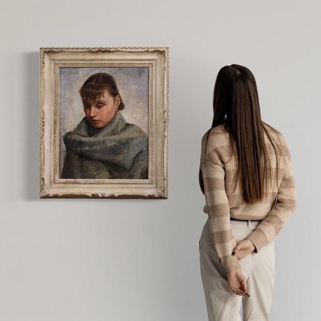 Early 20th-century Italian painting. Oil on canvas artwork depicting a portrait of a woman with an earring, in the...