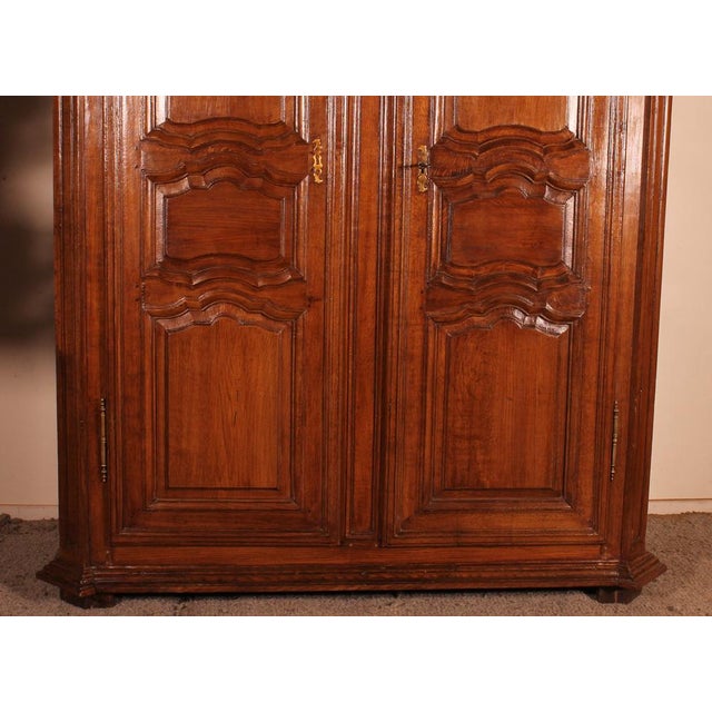 A fine and large wardrobe from the city Namur in Belgium from the 18th century in the Louis XIV style Very beautiful work...