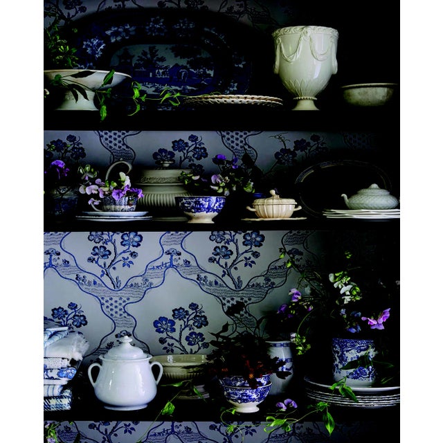 An eccentric, wavy trellis pattern, Marella is enlivened by charming botanical motifs. The wallpaper version of this...