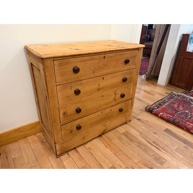 Up for sale in Sunapee Harbor is an Antique Scrubbed Pine Dresser. This dresser consists of 4 drawers of the same...