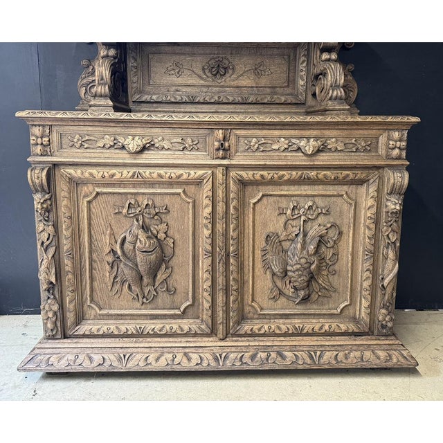 A really good French Hunting Sideboard, made from Oak and dating to the mid 19th Century. The stags head that adorns the...