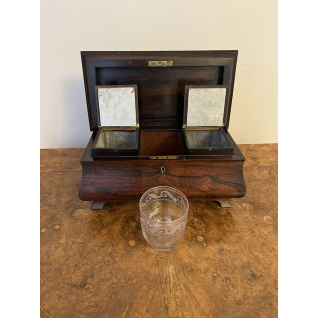 Attractive antique Victorian quality rosewood tea caddy, having an attractive bombe sarcophagus form quality tea caddy,...