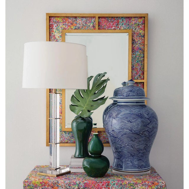 Aegean is our blue and white shaped temple jar in a modern wave pattern. Lift off lid. Base of the jar is 11" diameter....