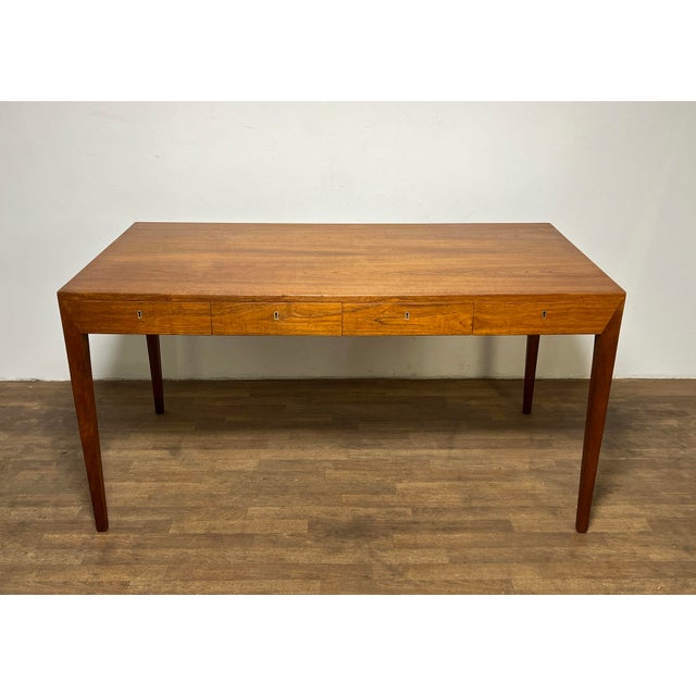 A teak desk, Model 36, designed by Severin Hansen for Haslev Mobelsnedkeri, circa late 1950s. Hansen's furniture designs...