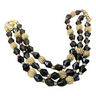 1980s Art Deco Style Black Cristal and Brass Multi Strand Bracelet by Trifari For Sale