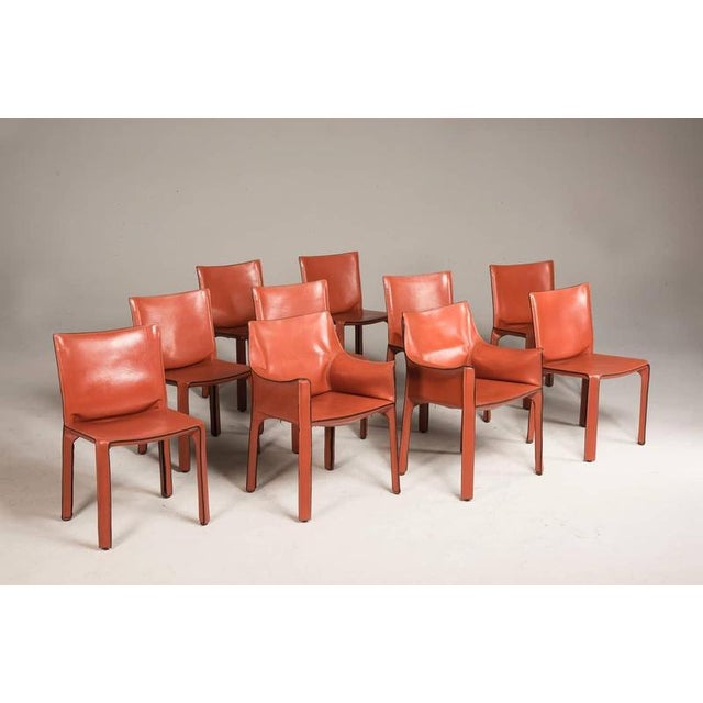 Set consisting of six chairs in leather Cab model by Cassina 90s series. In excellent condition with signs consistent with...