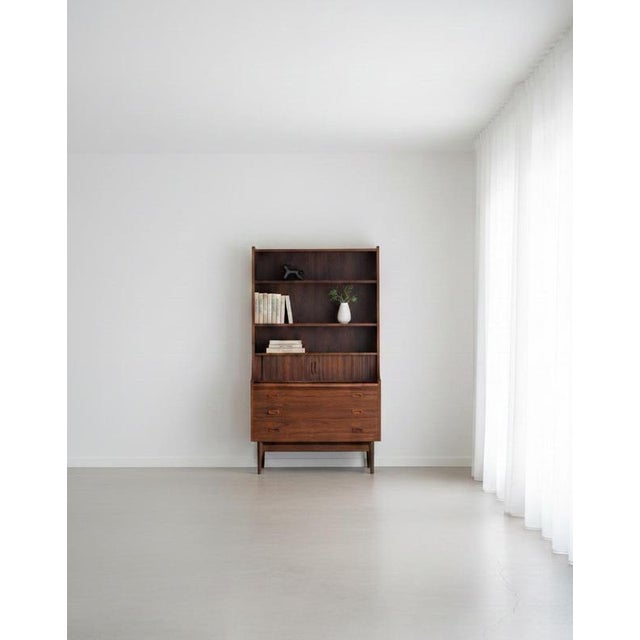 Rosewood bookcase designed by Johannes Sorth and produced by Nexø Møbelfabrik in the 1960s. A well-crafted and functional...