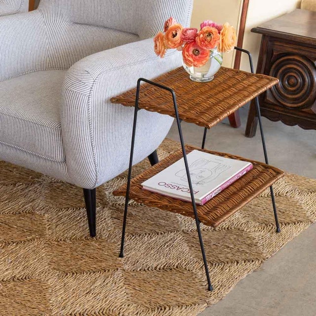 Unique rectangular two-tier wicker and iron side table from France, 1950s. Wicker table top with iron legs and slanted...