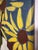 Original painting with sunflowers in a vase. The artwork shows three large yellow sunflowers with brown centers placed in...