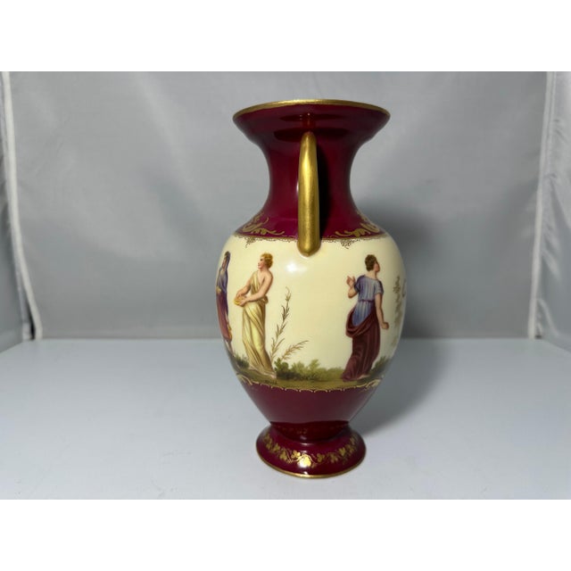 Antique Royal Vienna Hand Painted Vase for your consideration. The vase measures approx. 8 1/4 inches tall and approx. 4...