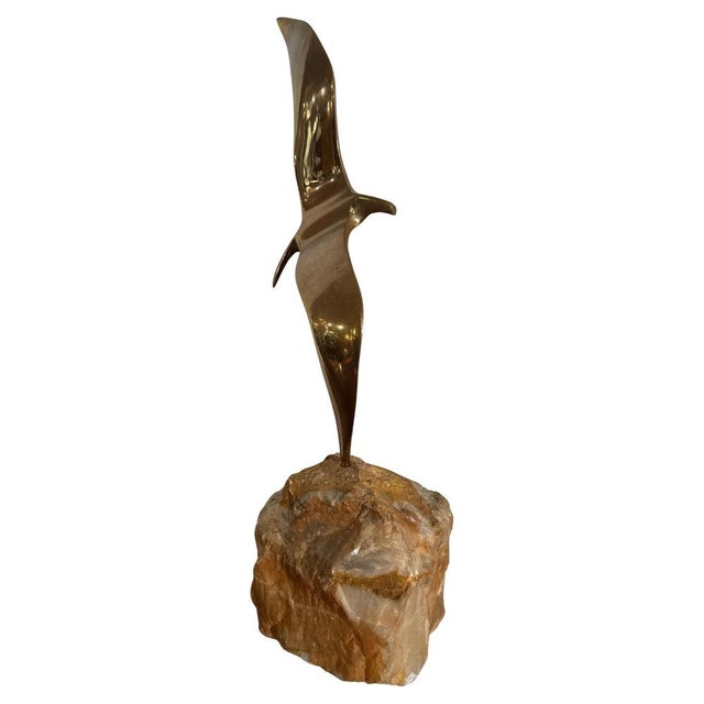 A dynamic Brass bird in flight designed by "Curtis Jeré" is the shared pseudonym of two American artists and designers,...