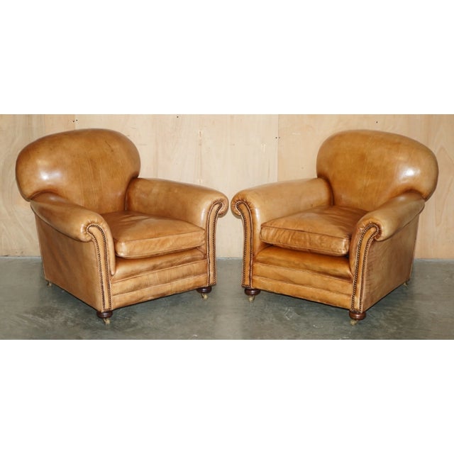 A fantastic looking and well made pair, the chairs have been lightly restored to include a deep clean, hand condition wax...
