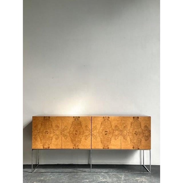 This monumental credenza is a masterclass in Postmodern luxury, echoing the sophisticated silhouettes popularized by...